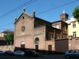 Edificio a uso abitazione e carrozzeria in via Genova 8